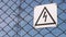 Warning sign of danger. High - voltage electrical substation. Probability of electric shock. Electric wires on the
