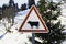 Warning sign with a designed black cow