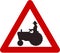 Warning sign with farm tractor