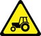 Warning sign with farm tractor