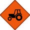 Warning sign with farm tractor