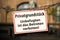 Warning sign with german text: Privatgrundstueck - Unbefugten ist das Betreten verboten private property - no trespassing