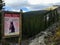 A warning sign for hikers hiking in the Rockies in Jasper National Park to be aware of Grizzly bears