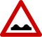 Warning sign with road bumps