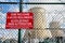 Warning sign on the security fence of a french nuclear power plant