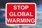 Warning sign STOP GLOBAL WARMING