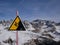 Warning sign - watch out and do not fa down  - San Pellegrino ski resortll