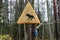 Warning sign and wildlife camera during moose hunting in Sweden