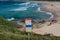 Warning sign on Wollongong city beach with beach on the background