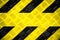 Warning sign with yellow and black stripes painted on steel checker plate or diamond plate hazard danger warning background