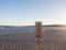 Warning signs on Chinaman`s Beach, Murchison River beach, Kalbarri, Western Australia.