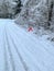 Warning triangle, car breakdown in winter on a snowy road in Sweden