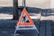 Warning triangle, with the German inscription Sewer rehabilitation
