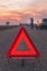 Warning triangle sign on the road