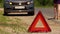 Warning Triangle Stands On The Road
