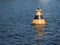 Warning vessel striped buoy in the water