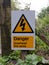 Warning yellow triangle sign danger overhead live wires