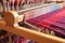 warp threads tensioned on a tapestry loom