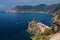 Warrior Painted on Side of Shack with Coastal View of Vernazza in Cinque Terre Italy