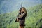 She is warrior. Woman attractive long hair pretty face hold rifle for hunting. Dangerous girl. Defending concept