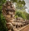 Warriors line entrance to south gate angkor thom