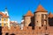 Warsaw Barbican fortified outpost as part of brick and stone historic defence walls with Stare Miasto Old Town quarter in