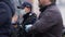 Warsaw, Poland 04.15.2020 - Protest of Enterpreneurs, Young policeman with protective facemask in the crowd of the