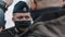 Warsaw, Poland 05.16.2020. - Protest of the Entrepreneurs. Portrait of a policeman with facemask speaking with people