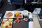 WARSAW, POLAND - 11 MAY 2018: Cold food on a transatlantic flight in Premium Economy Class