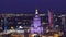 WARSAW, POLAND - AUGUST 26, 2017. Palace of Culture and Science establishing aerial night shot