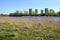 Warsaw, Poland - Czerniakowskie Lake nature reserve in Czerniakow quarter of Warsaw with residential developments in background