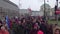 WARSAW, POLAND - DECEMBER, 17, 2016. People with Polish and EU flags marching in the street. 4K steadicam overhead shot