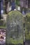 Warsaw, Poland - December 27, 2022: Old and neglected tombstones in jewish cemetery in Warsaw in Poland