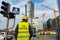 Warsaw Poland. February 18, 2019. The builder goes to construction along the road. Builder near the traffic light. The