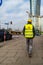 Warsaw Poland. February 18, 2019. The builder goes to construction along the road. Builder near the traffic light. The