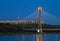 Warsaw, Poland - July 20, 2016: Panoramic view of the rising fullmoon over the National Stadium and Swietokrzyski Bridge