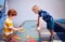 WARSAW, POLAND - June 20, 2019: Kids playing with magnetic words in the Copernicus Science Centre in Warsaw, Poland