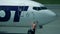 WARSAW, POLAND - MAY, 18, 2017. LOT Boeing 737 airliner being maintained at the airport. Telephoto lens shot