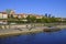 Warsaw, Poland - Panoramic view of historic quarter of Warsaw with Royal Castle and old town tenements seen from the Vistula river