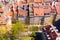 Warsaw, Poland red orange roof in old town market square with historic street town architecture and windows rooftop closeup