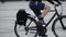 WARSAW, POLAND - SEPTEMBER 14, 2017. Young man riding classic city bicycle with a bag