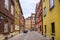 Warsaw, Poland - Typical old town street with XIX century tenements - Krzywe Kolo street - in Starowka historic quarter in Warsaw