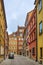 Warsaw, Poland - Typical old town street with XIX century tenements - Krzywe Kolo street - in Starowka historic quarter in Warsaw