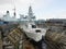 Warship M33 in drydock with HMS dauntless in the background