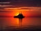 Warship Silhouette Sailing at Sunset