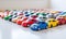 It was a car enthusiast\\\'s dream, with a multitude of toy cars displayed on the white table