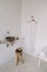 Wash basin vintage. Retro stoned sink. romantic vintage bathroom interior. Design loft  with wood and concrete.