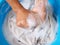 Wash white clothes and soak cloth in laundry detergent water in tub