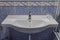 Washbasin with faucet close-up