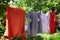 Washed laundry hanging outdoors. Summertime